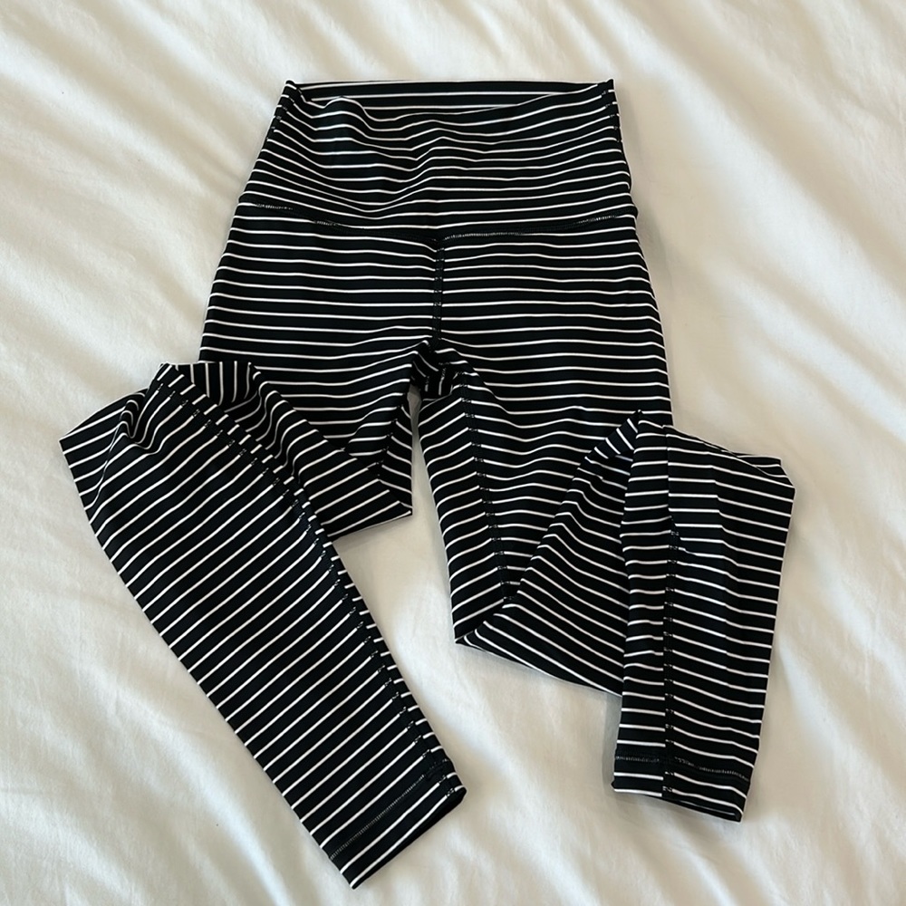 Lululemon. Black and white striped leggings. Size 4.